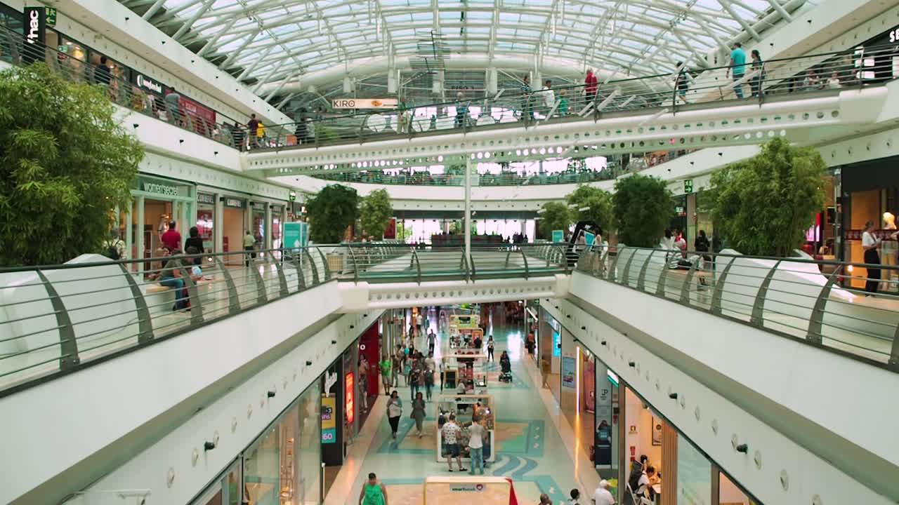 People Crowd Looking For Sales In Vasco da Gama Shopping Center Mall.