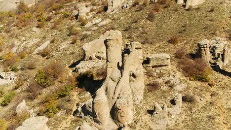 aerial view of unique rock formations in a mountainous landscape