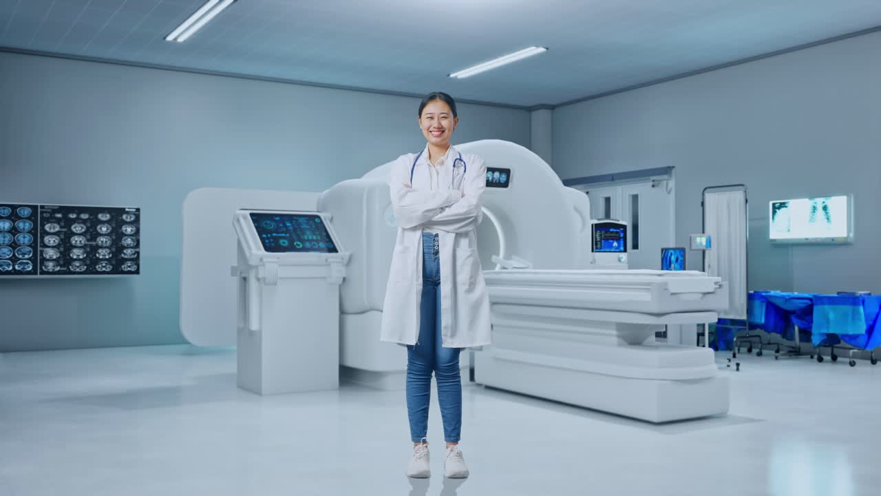 Full Body Of Asian Woman Doctor With Stethoscope Crossing Her Arms And Smiling With Mri Machine In The Hospital