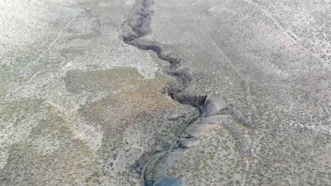 aerial cinematic shot, of a canyon near san pedro de atacama in the atacama desert, northern chile, south america