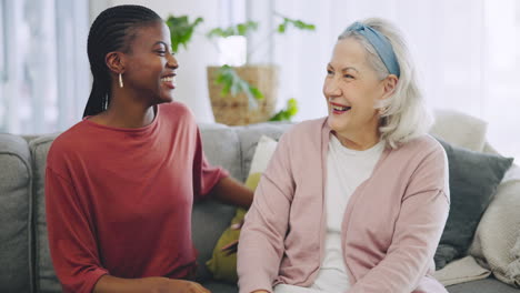 Senior-woman,-caregiver-and-hug-with-love-on-sofa