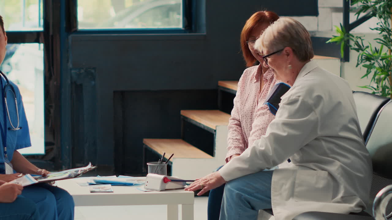 Doctor checking patient's blood pressure in waiting room