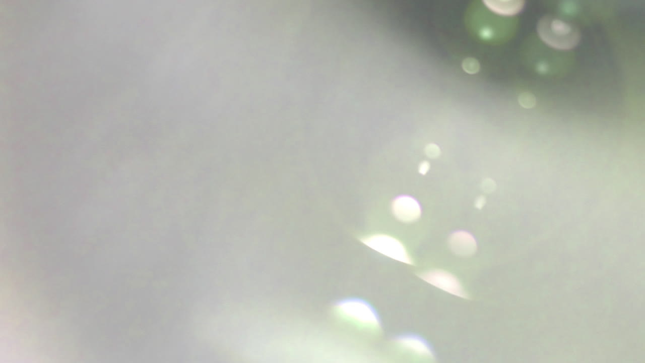 Abstract Light Leaks and Green Lens Flares Transition