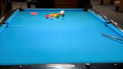 breaking balls at game of 9 ball in billiard