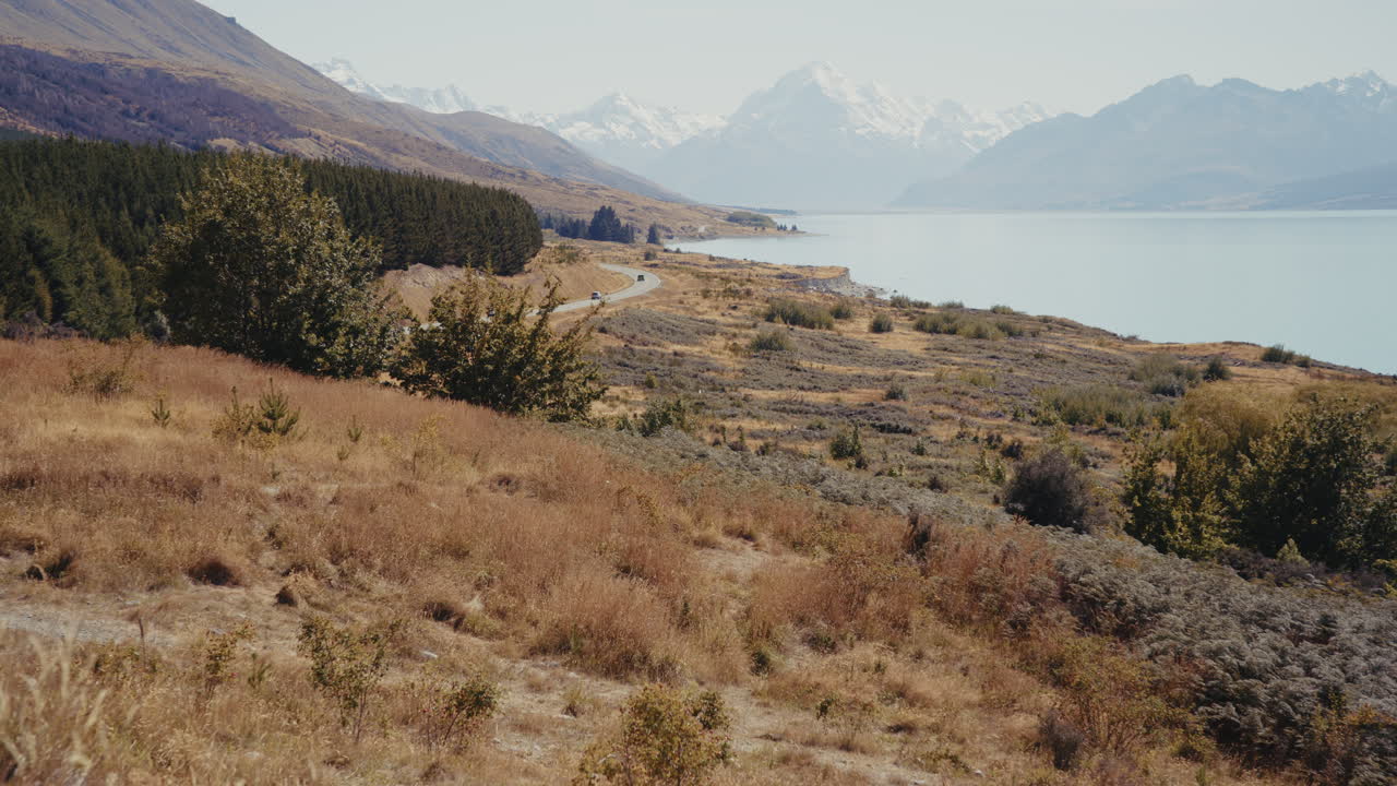 Mountainous Lake Scenery with Road in New Zealand