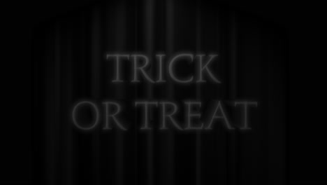 Trick-or-Treat-with-white-light-rays-on-dark-space