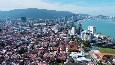 view of the majestic city of penang with background of penang hill, aerial
