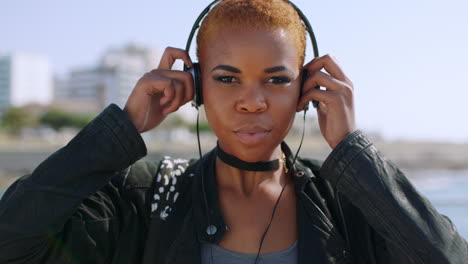 Face,-front-and-headphones-for-music-with-a-woman