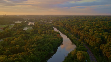 drone capturing the huron river in ann arbor, michigan, with a slow flight in summer.