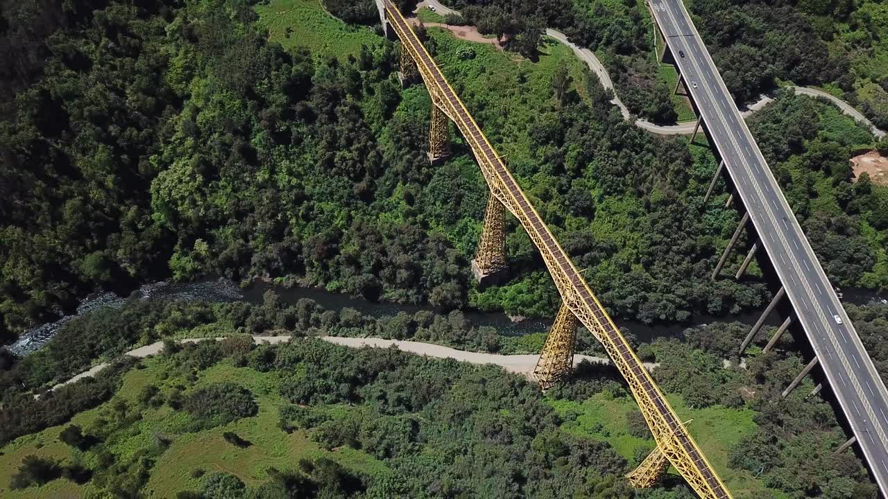 Birdseye Aerial View of Malleco Viaducto and Panamericana Highway. Old Railway Bridge Above River Canyon and Green Landscape