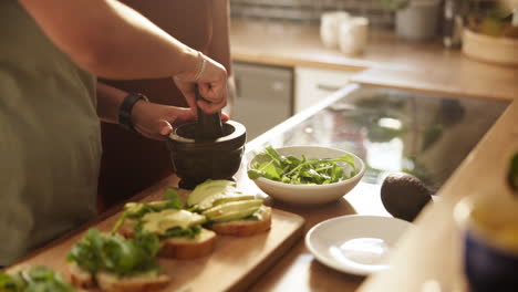 preparing healthy avocado toast