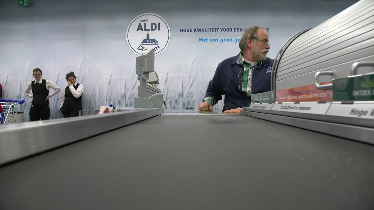 Aldi checkout with employees