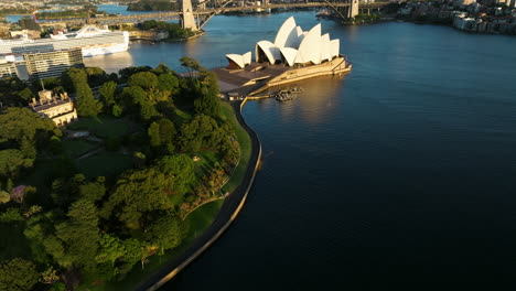 the harbour bridge, sydney opera house and central business district of sydney in australia - aerial drone shot