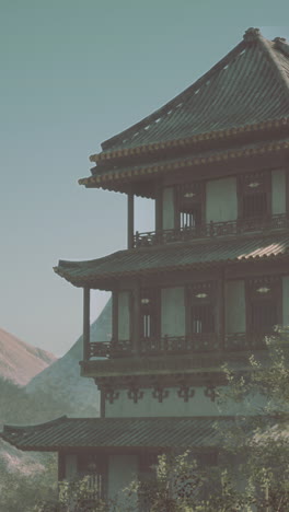 vintage asian pagoda in misty mountain landscape