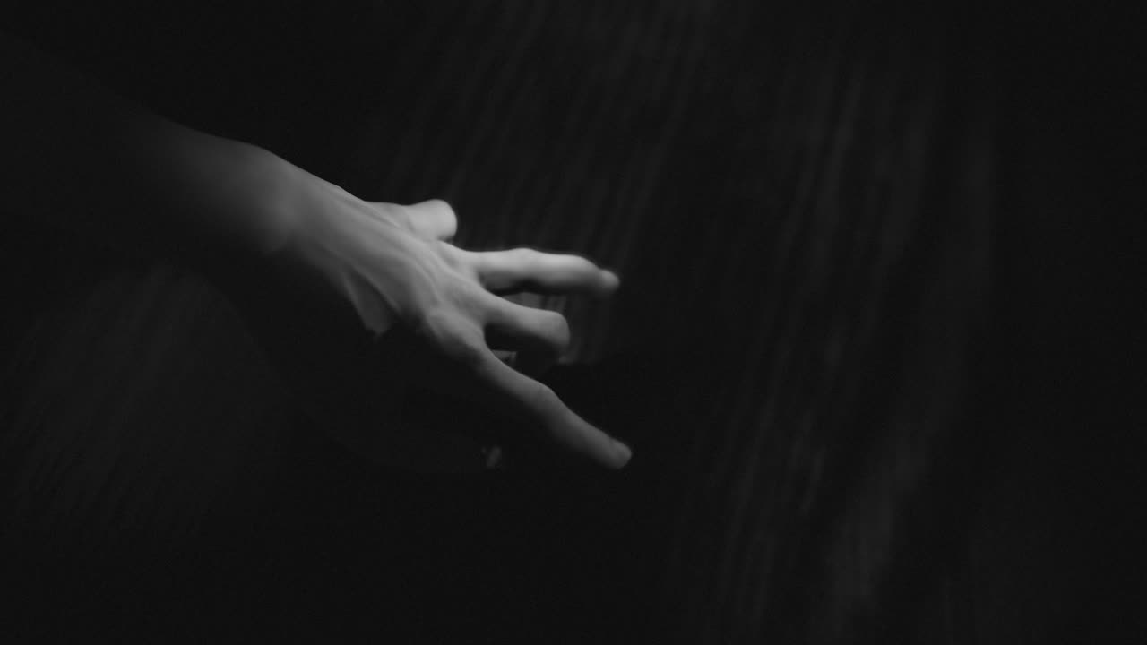 어두운 공간에서  ⁇ 는 손의 애니메이션