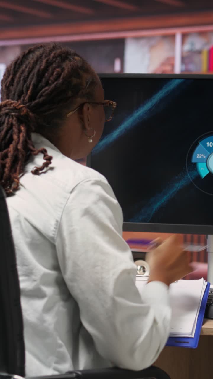 Vertical video Student doing academic research on internet to gain career knowledge