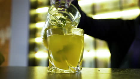 bartender pouring a drink