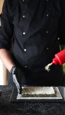 chef preparing sushi