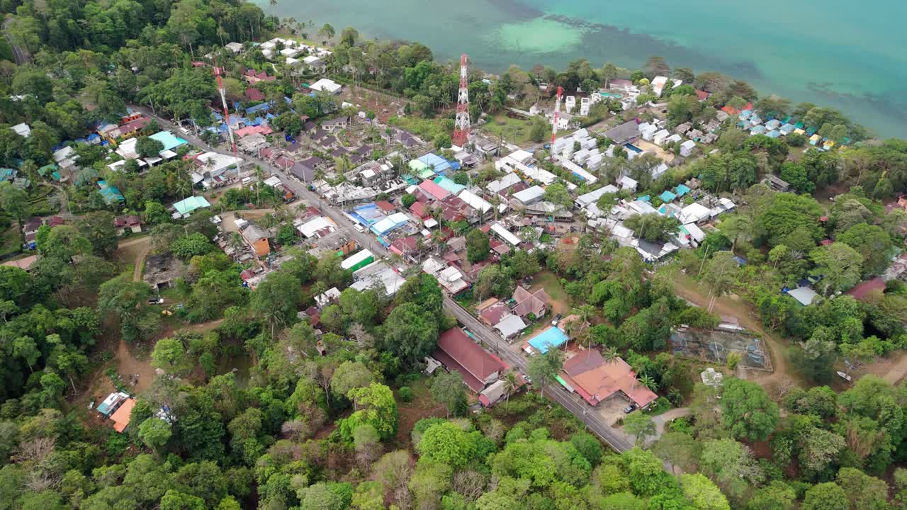 Drone view of Lonely Beach village and tropical sea at Koh Chang the coastline, mountains and jungle