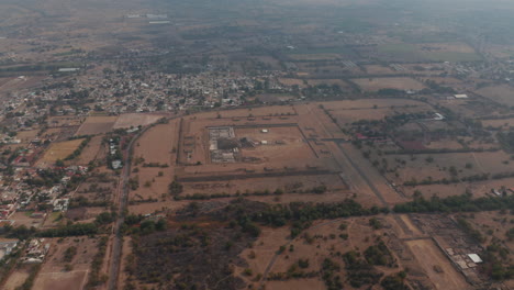 Birds-eye-view-of-Plaza-Oeste-in-Teotihuacan-complex-in-Mexico.-High-angle-view-of-Teotihuacan-complex,-ancient-mesoamerican-city-located-in-Valley-of-Mexico.-Unesco-world-heritage