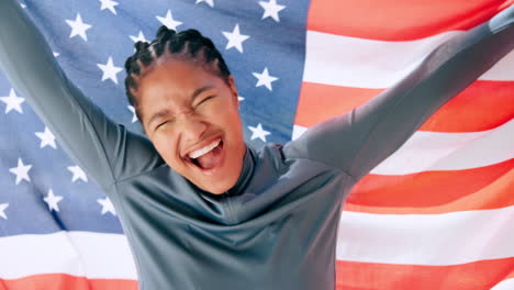 woman celebrating with american flag