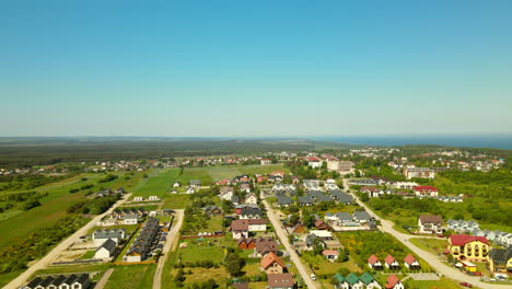 Rural-town-of-Jastrzebia-Gora-in-Poland-with-traditional-buildings,-aerial