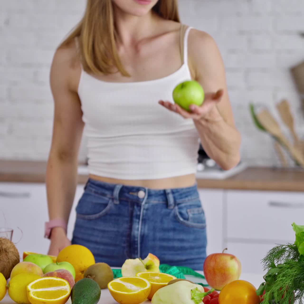 Woman kitchen portrait with fruits