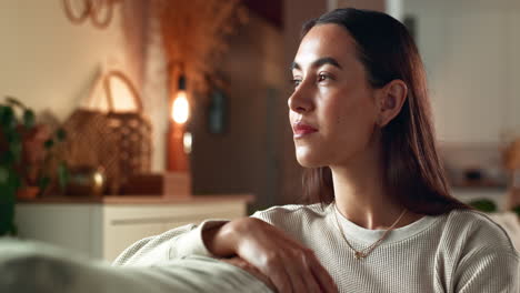 thoughtful woman in cozy living room