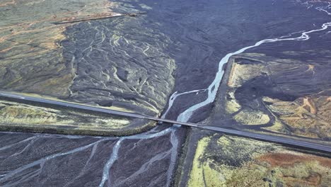 vast land and the single lane bridge over skeidará in southern iceland