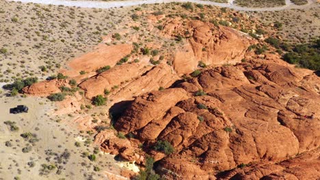 aerial view of shapes and geology of red sandstone cliffs in arizona, usa - circling, drone shot