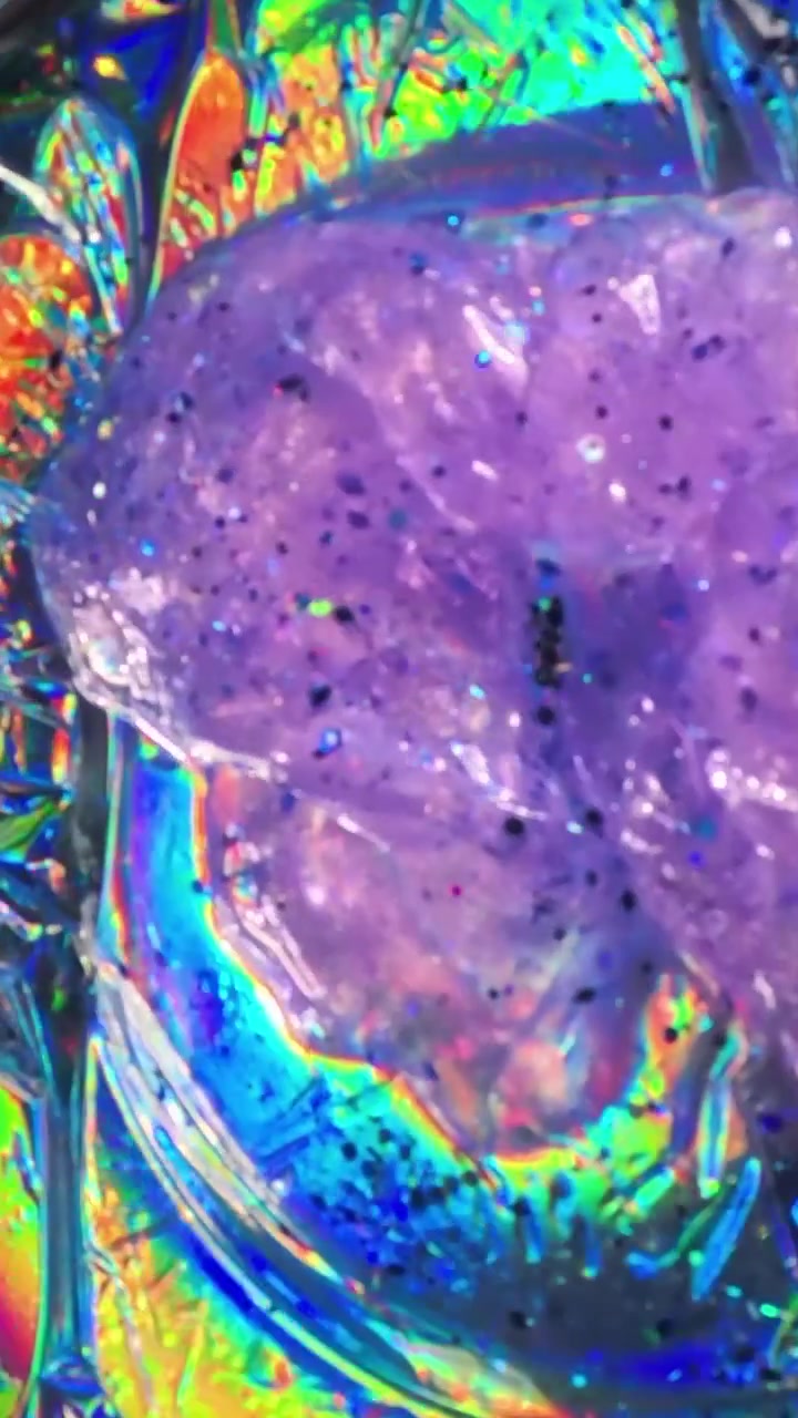Texture di slime glitterato viola.