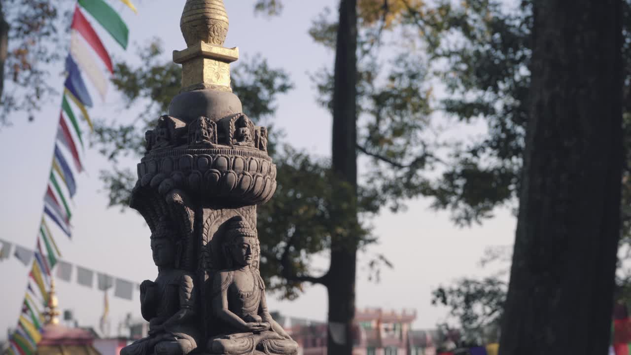 Ancient Carved Stone Structure Decorated With Traditional Buddhist Patterns At Swayambhunath Stupa In Kathmandu, Nepal - close up shot