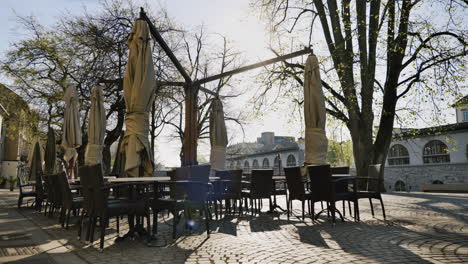 empty outdoor cafe on a sunny spring day