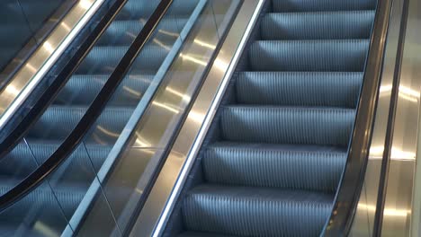 escalator with stainless steel handrails