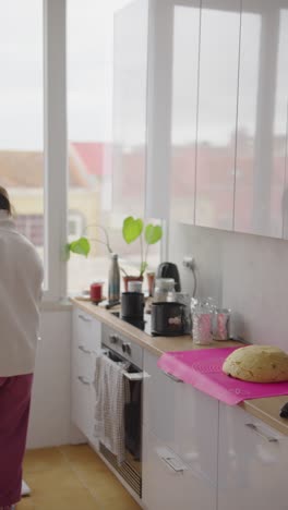 woman baking in a modern kitchen