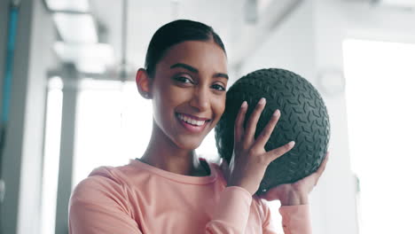 Woman,-face-and-medicine-ball