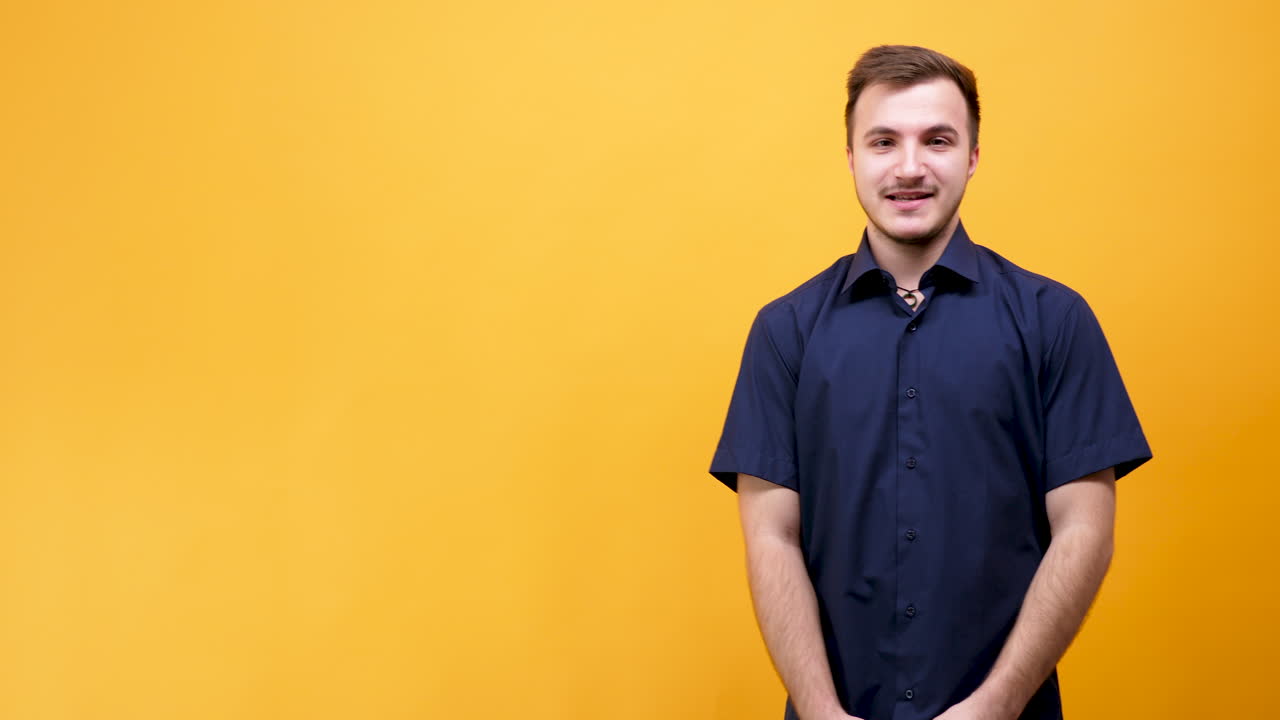 Portrait of a man on yellow background