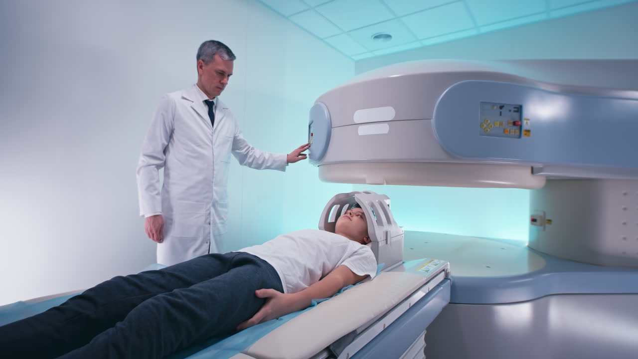Child undergoing MRI scan with doctor