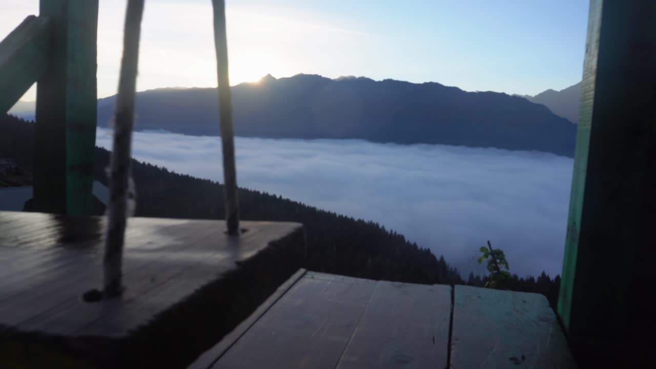Swinging over clouds mountain turkey