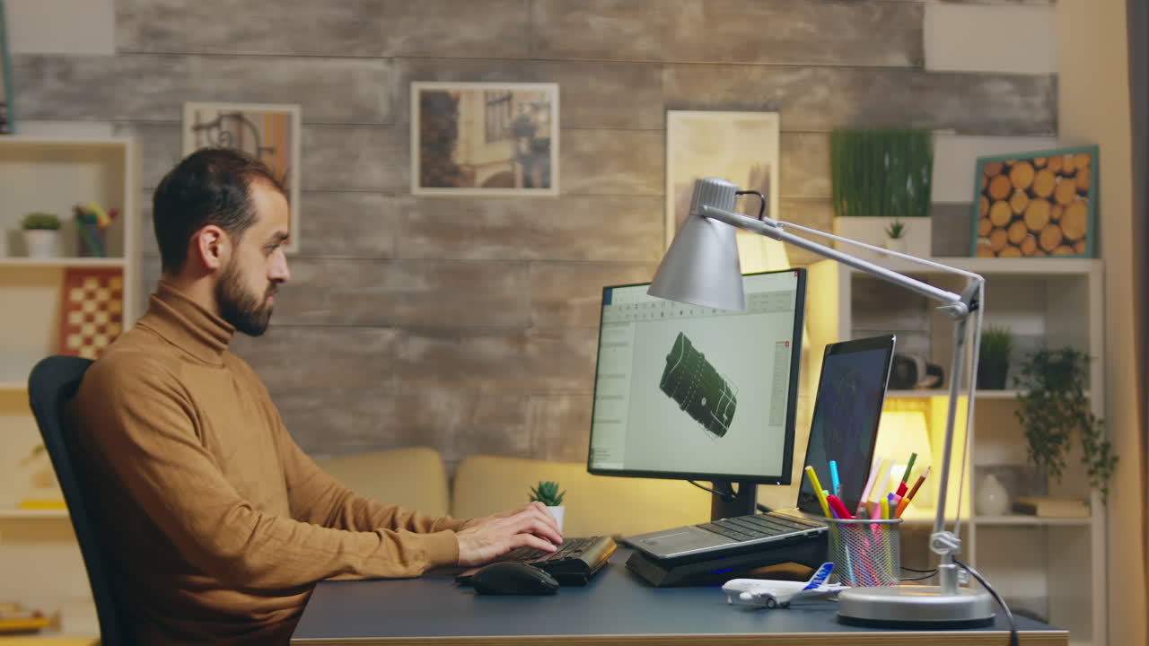 Engineer typing data for turbine design