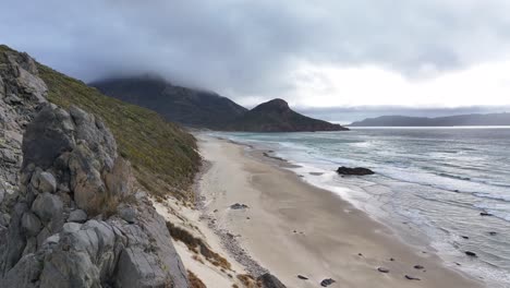 West-Ruggedy-Beach-reveal-over-sharp-rock-formation