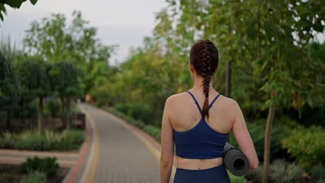 woman practicing yoga outdoors