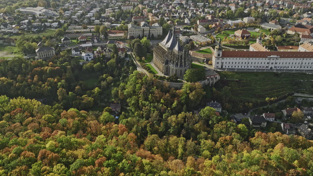 Kutna Hora Czechia Aerial v14 drone flyover hillside park around St Barbara's Cathedral, GASK art gallery and town center capturing beautiful autumn townscape - Shot with Mavic 3 Cine - November 2022
