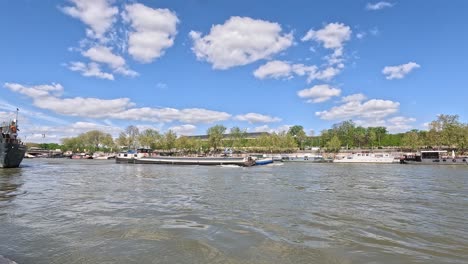 boat traversing a river with changing views