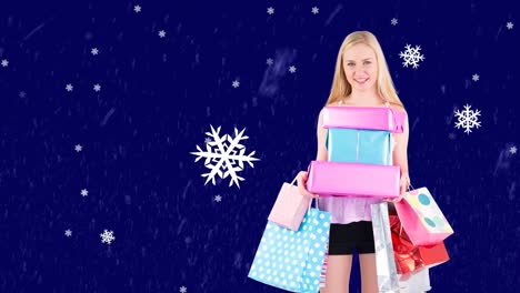 Animation-of-snowflakes-over-caucasian-girl-with-presents-on-navy-background