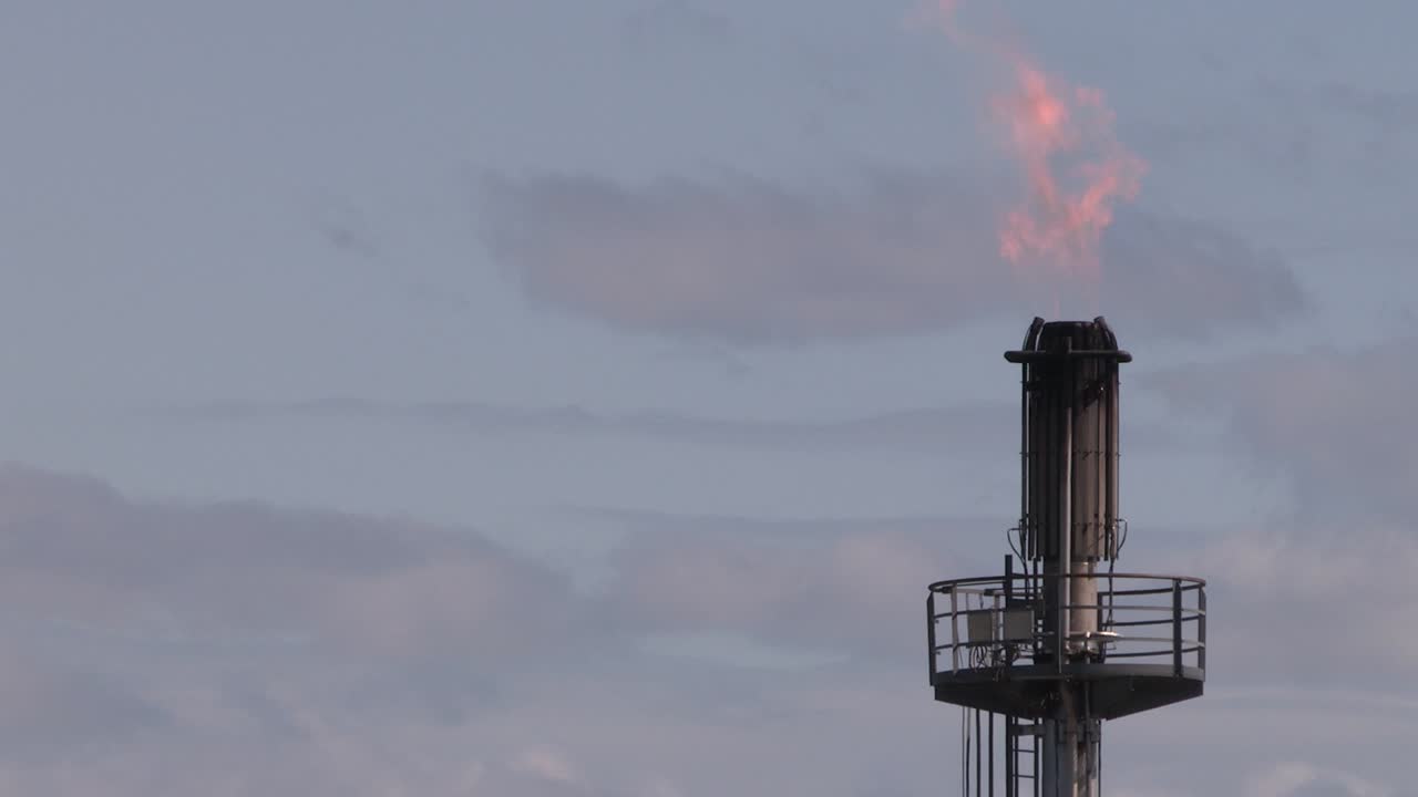 Refinery Flaring Gas at the top of a tower