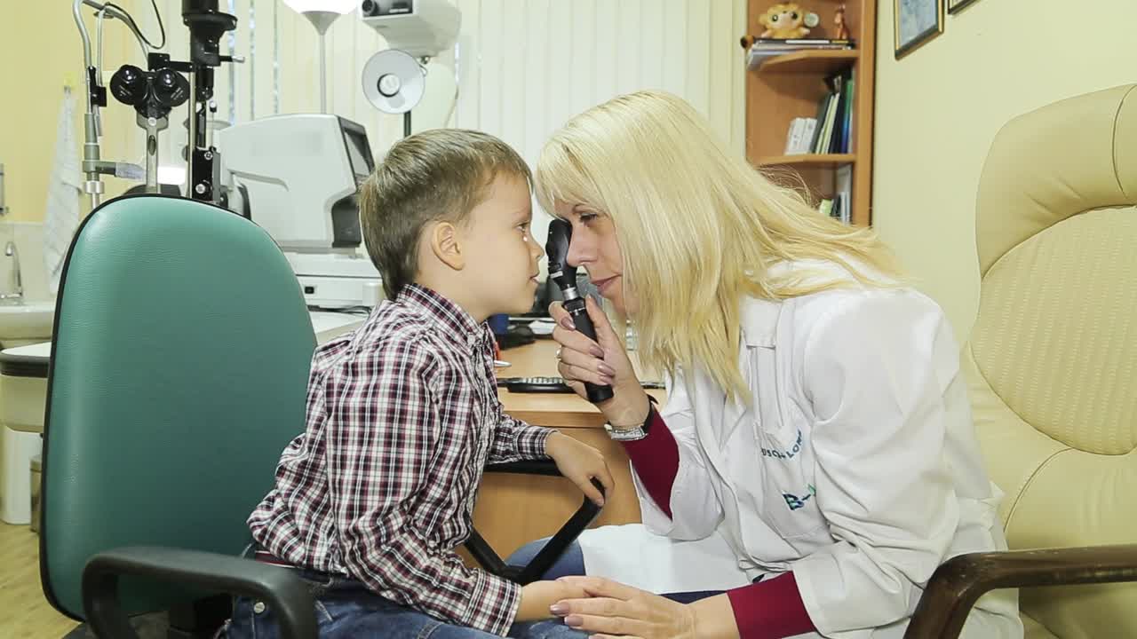 Optometrist checking patient eyesight and vision correction. Eye examination