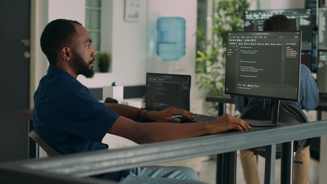 African american coder developing app interface with html code and script