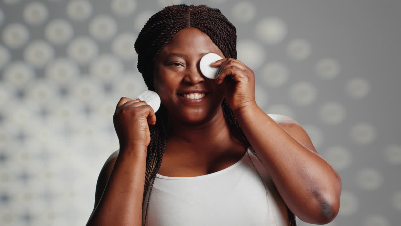 Woman with cotton pads