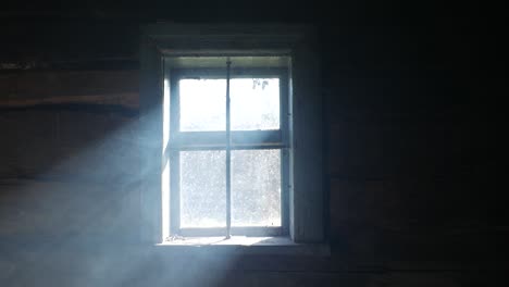 smoke in a ray. light falling from a window.